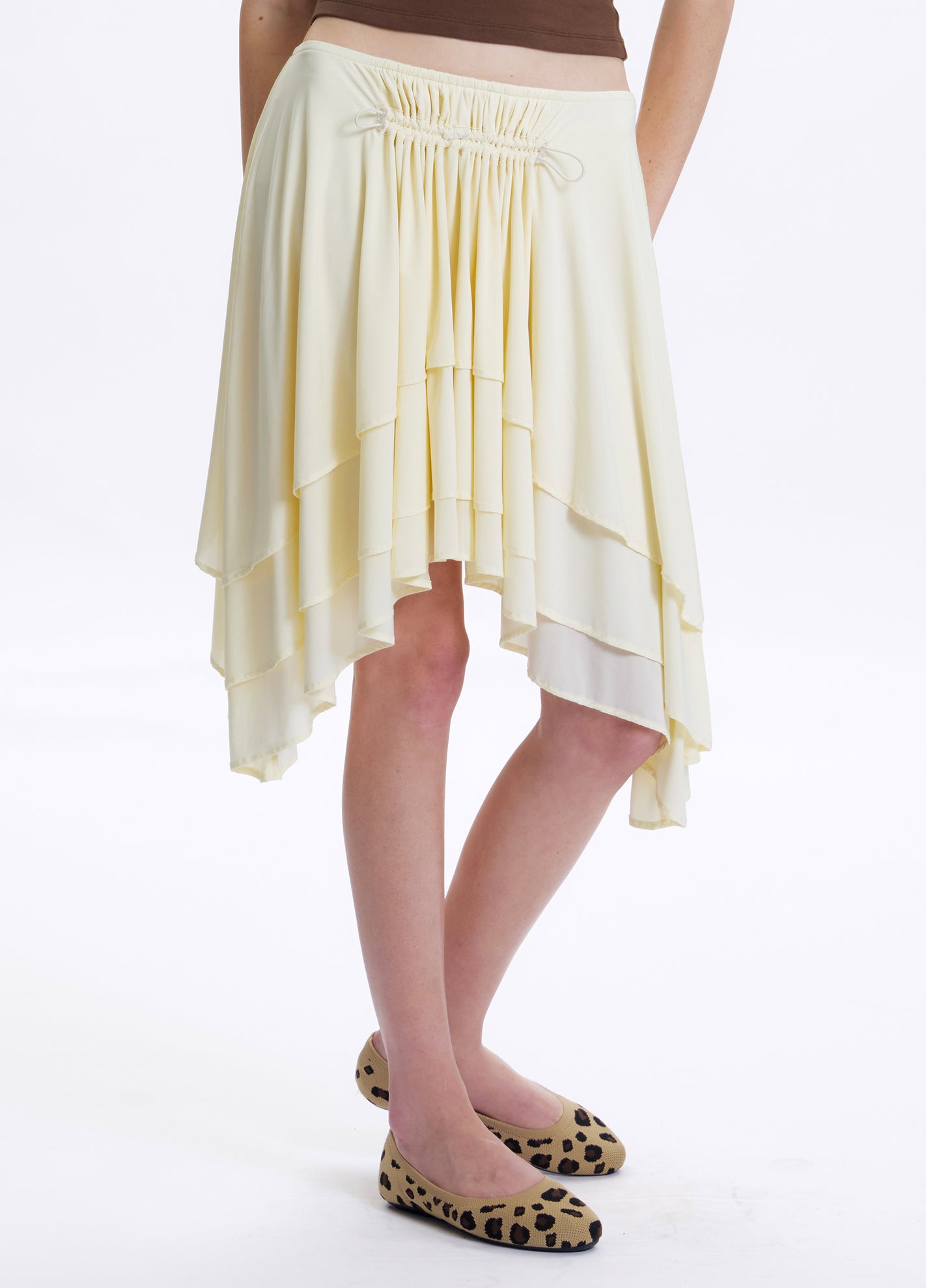 Stacked pleated nylon yellow drawstring skirt